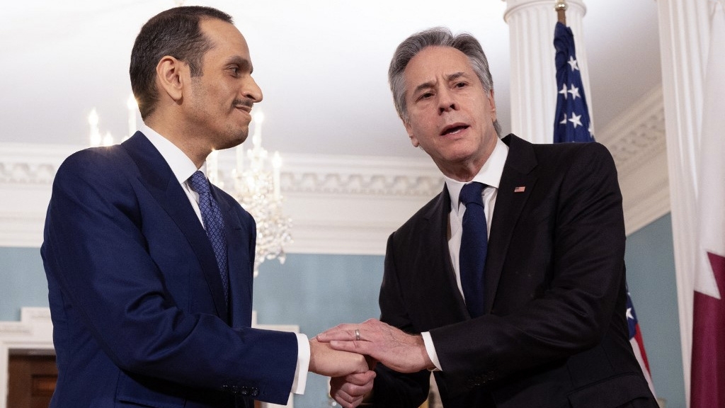 Qatari Prime Minister Mohammed bin Abdulrahman Al Thani greets US Secretary of State Antony Blinken in Washington on 5 March 2024 (Tasos Katopodis/Getty Images/AFP)